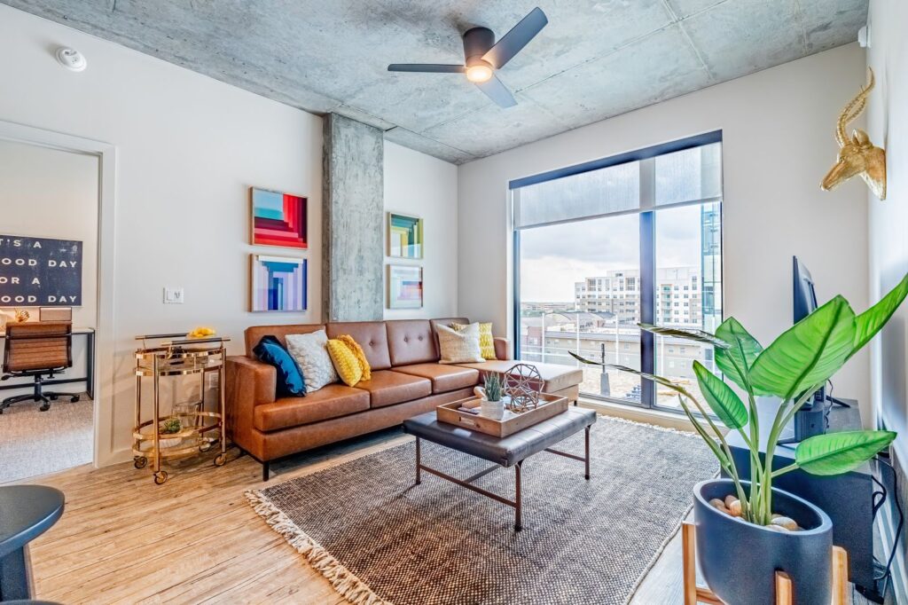 Rev Student Living Common. Room with Seating and Natural Lighting