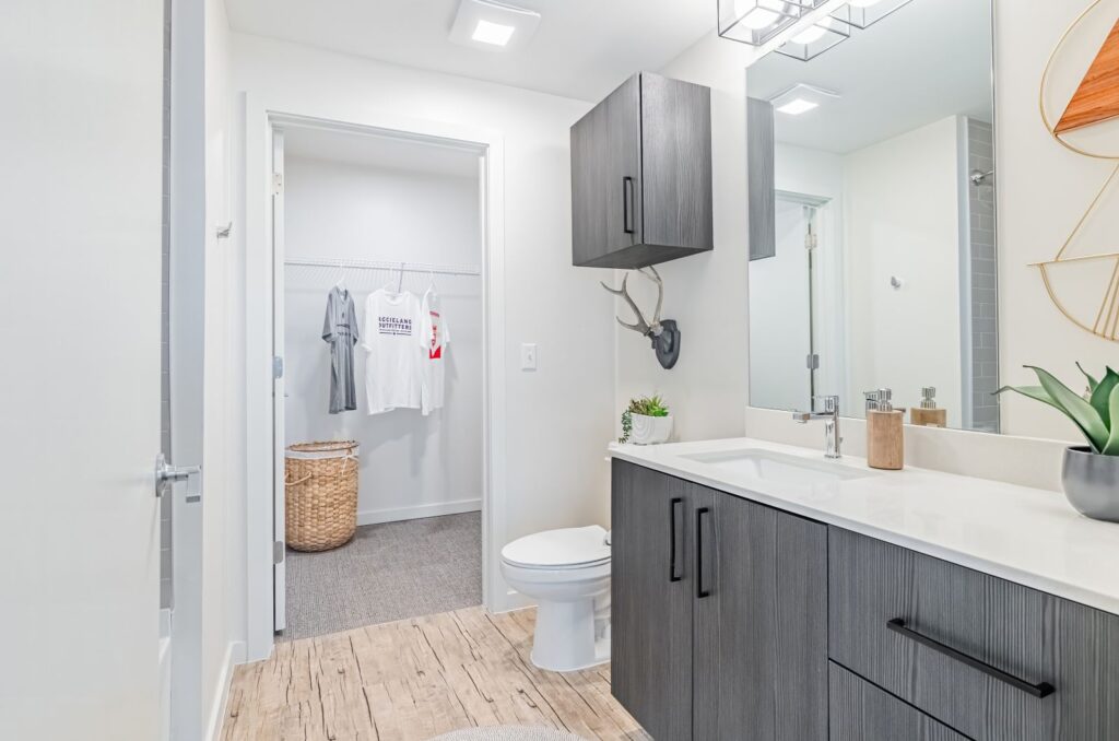 Rev Student Living Male Bathroom with Gray Cabinets